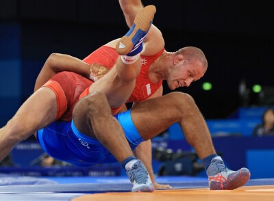 Жан Беленюк виконує активну дію під час бронзового фіналу Олімпійських ігор-2024.