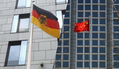 Німеччина розглядає можливість пом'якшення плану з перевірки китайських інвестицій / колаж УНІАН, фото УНІАН, фото Reuters